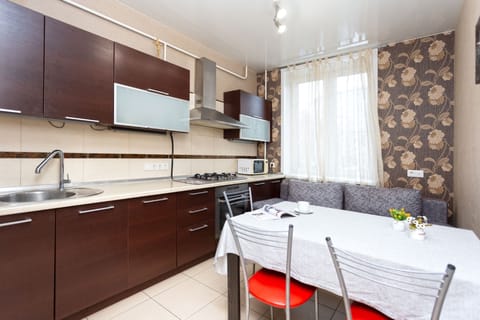 Apartment | Private kitchen | Fridge, electric kettle, freezer, paper towels