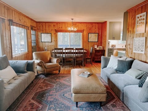 Enjoy meals, movies and games by the fire in the Living/Dining Room.