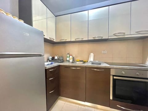 Family Apartment | Private kitchen | Electric kettle, toaster, dining tables