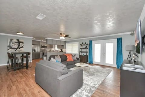 Enjoy the seamless flow between the living room, kitchen, & dining area.