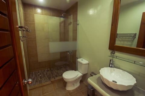 Deluxe Room, 2 Queen Beds, Partial Ocean View | Bathroom | Shower, rainfall showerhead, hair dryer, towels