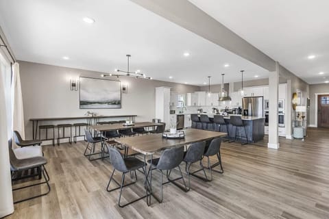 Dining Room. Full kitchen with island in background