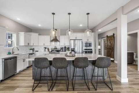 Large, fully-stocked kitchen & island