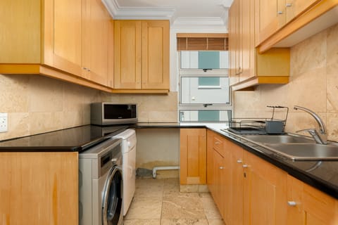 Luxury Apartment | Private kitchen | Full-size fridge, microwave, oven, stovetop