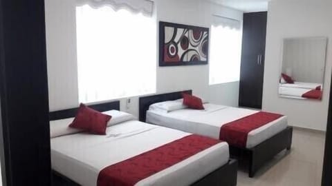 Twin Room | Minibar, blackout drapes, free rollaway beds, free WiFi