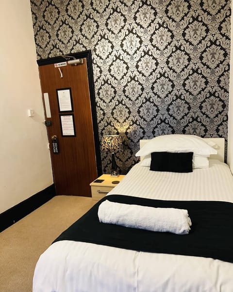 Standard Single Room | Premium bedding, desk, laptop workspace, free WiFi