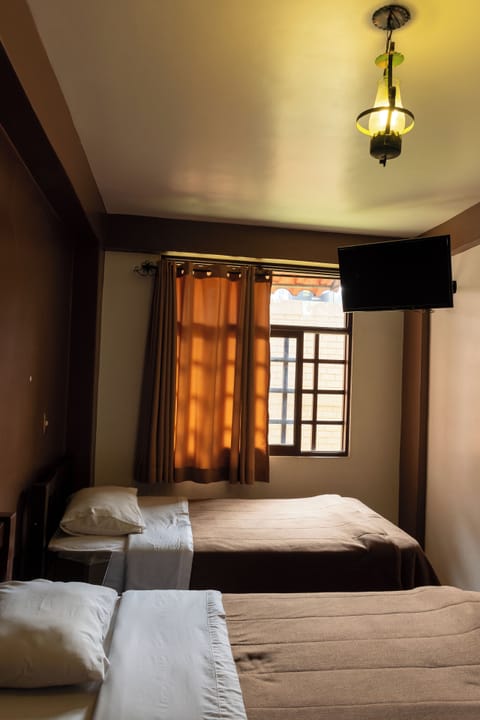 Standard Twin Room, Garden View | Blackout drapes, free WiFi, bed sheets