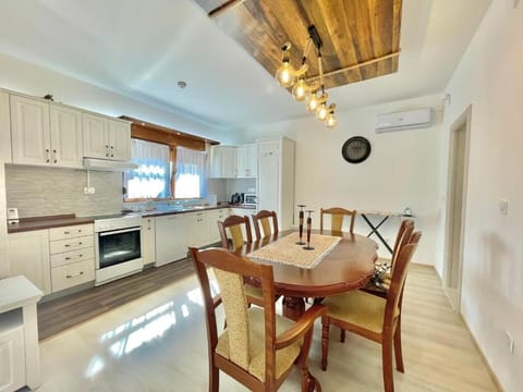 Deluxe Villa | Private kitchen | Fridge, stovetop, dishwasher, electric kettle