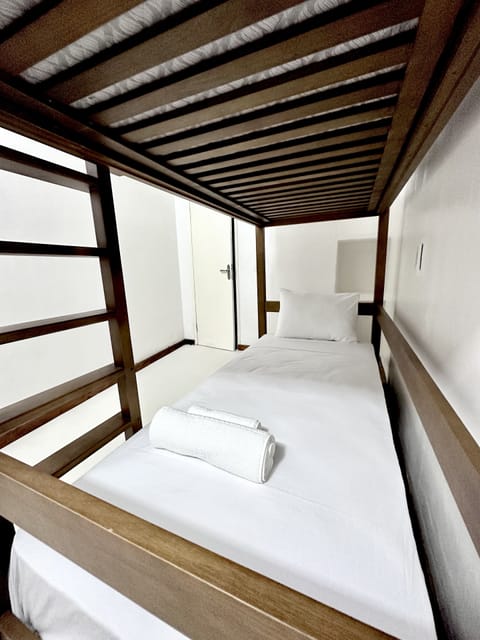 Economy Double Room | Pillowtop beds, minibar, individually decorated, individually furnished