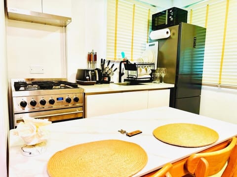 Deluxe Studio | Private kitchen | Full-size fridge, microwave, oven, stovetop