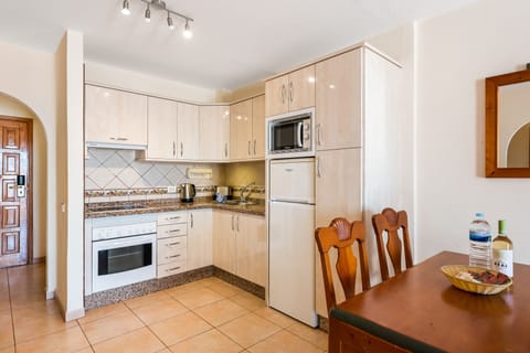 Family Apartment, 2 Bedrooms | Private kitchen | Fridge, microwave, oven, stovetop