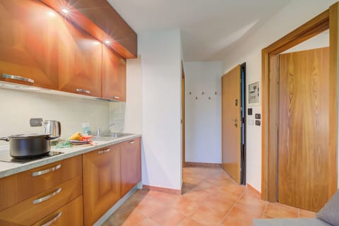 Family Apartment, 1 Bedroom (L' Aquila Campo Smith On The Ski) | Private kitchen | Fridge, stovetop, electric kettle, cookware/dishes/utensils