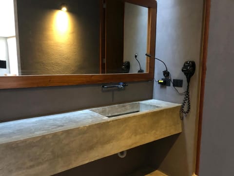 Deluxe Suite | Bathroom | Designer toiletries, hair dryer, towels, soap