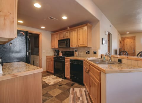 Town Home | Fox Point at Redstone A | Private kitchen | Full-size fridge, microwave, stovetop, dishwasher