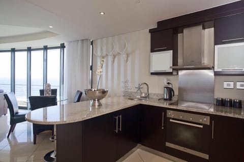 Luxury Apartment, 3 Bedrooms, Beach View | Private kitchen | Full-size fridge, microwave, stovetop, dishwasher