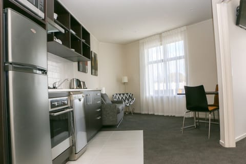 One Bedroom Apartment | Private kitchenette | Fridge, microwave, stovetop, coffee/tea maker
