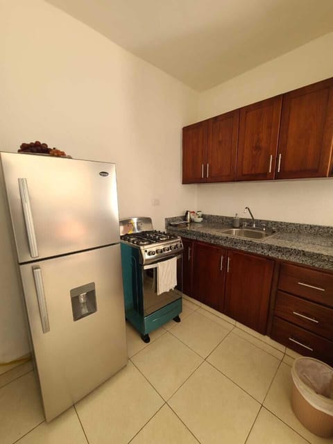 Full-size fridge, oven, coffee/tea maker, blender