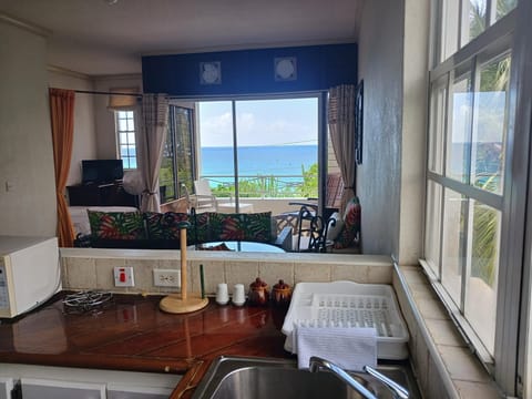 Apartment, 1 Bedroom, Ocean View | In-room safe, desk, iron/ironing board, free WiFi