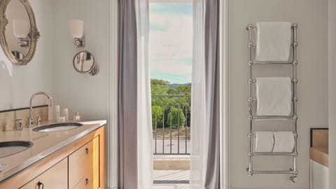 Suite, 2 Bedrooms | Bathroom | Separate tub and shower, designer toiletries, hair dryer, bathrobes