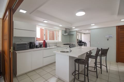 Villa | Private kitchen | Full-size fridge, microwave, oven, stovetop