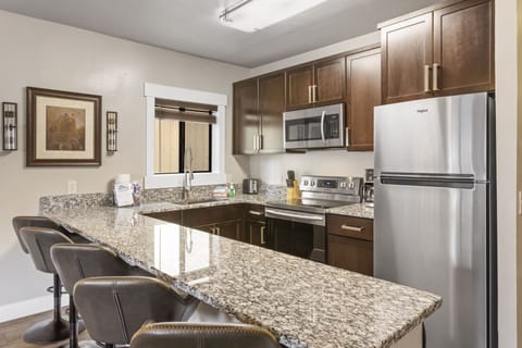 Apartment | Private kitchen | Full-size fridge, microwave, oven, stovetop