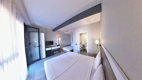 Standard Quadruple Room, Private Bathroom, Sea View | Premium bedding, minibar, in-room safe, blackout drapes