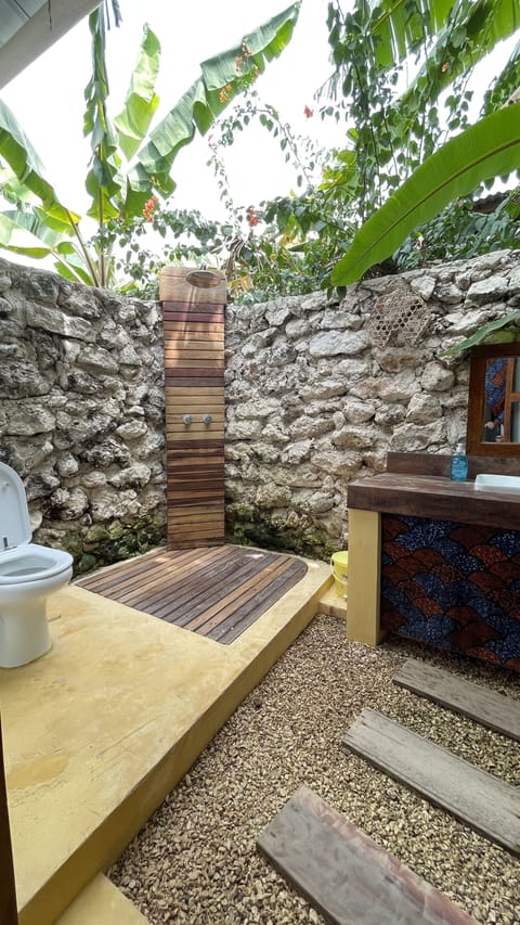 Signature Room | Bathroom | Shower, rainfall showerhead, hair dryer, towels