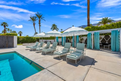 Outdoor pool, free cabanas, pool umbrellas