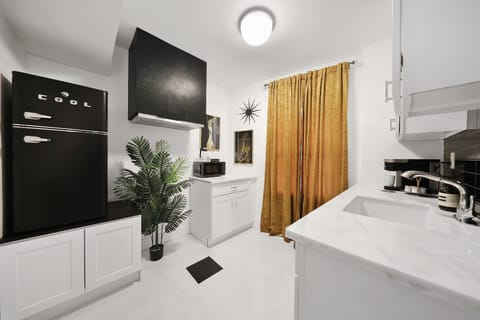 Presidential Studio Suite, 1 King Bed, Accessible, Pool View | Private kitchenette | Coffee/tea maker