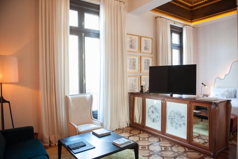 Suite, 1 Bedroom, City View | Living area | Flat-screen TV