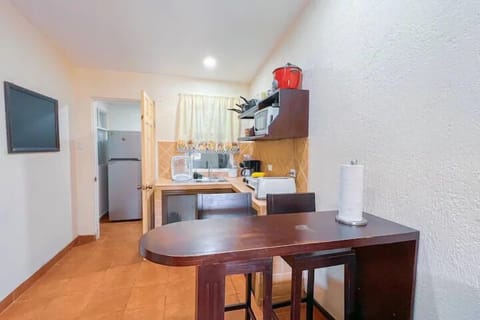 Standard Villa | Private kitchen | Fridge, microwave, stovetop, cookware/dishes/utensils