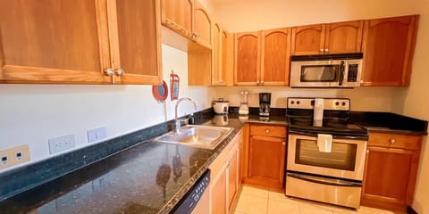 Basic Apartment, 2 Bedrooms | Private kitchen | Full-size fridge, microwave, stovetop, dishwasher