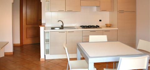 Apartment, 2 Bedrooms | Private kitchen | Full-size fridge, stovetop, coffee/tea maker, cookware/dishes/utensils