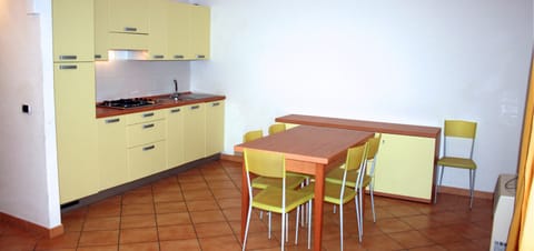 Apartment, 1 Bedroom | Private kitchenette | Full-size fridge, stovetop, coffee/tea maker, cookware/dishes/utensils