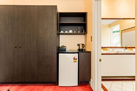 Family Quadruple Room | Minibar, in-room safe, individually decorated, individually furnished