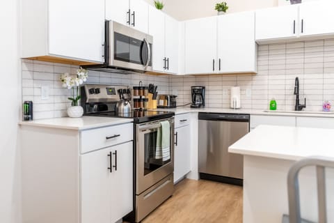 Exclusive Apartment | Private kitchen | Full-size fridge, microwave, oven, stovetop