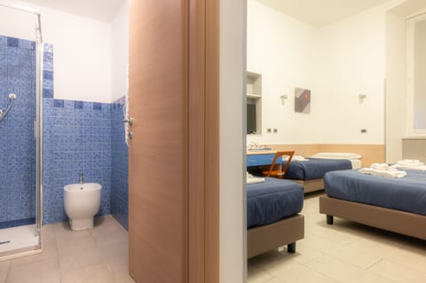 Quadruple Room | 2 bedrooms, down comforters, memory foam beds, in-room safe