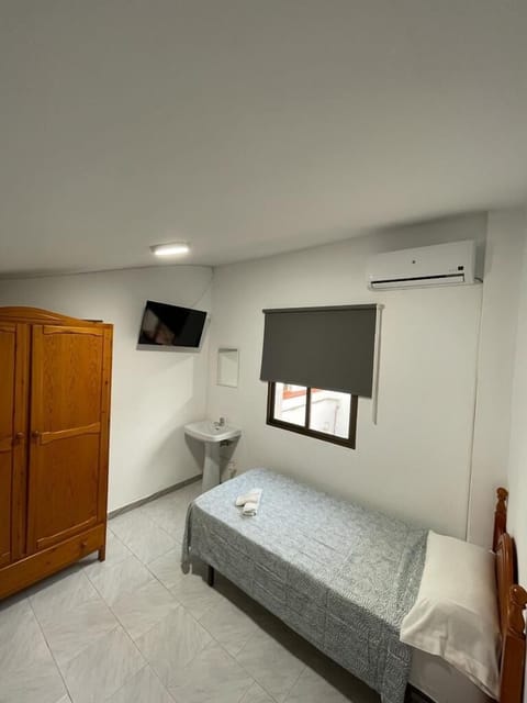 Basic Single Room | Free WiFi, bed sheets