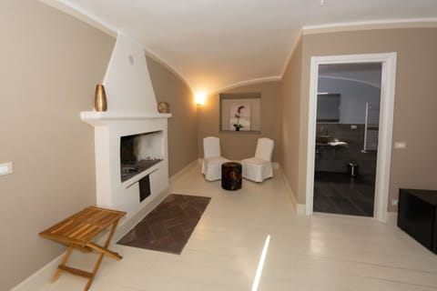 Romantic Suite | Living area | 30-inch flat-screen TV with cable channels