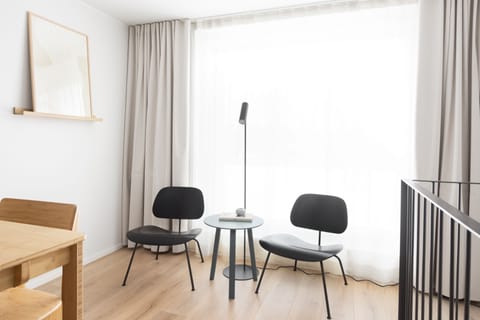 Spacious studio with loft | Desk, laptop workspace, blackout drapes, soundproofing