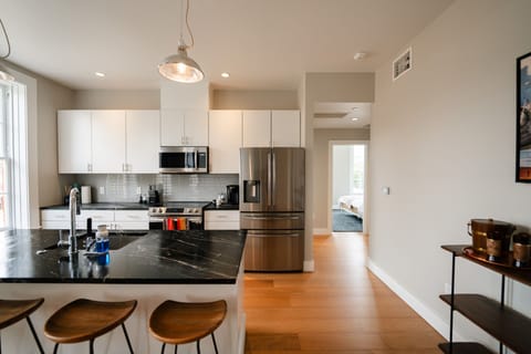 Coupe - 2/1.5 with Main St View | Private kitchen | Full-size fridge, microwave, oven, stovetop