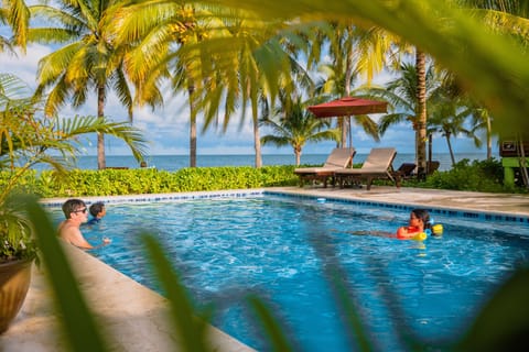 Outdoor pool, open 9:00 AM to 6:00 PM, pool umbrellas, sun loungers