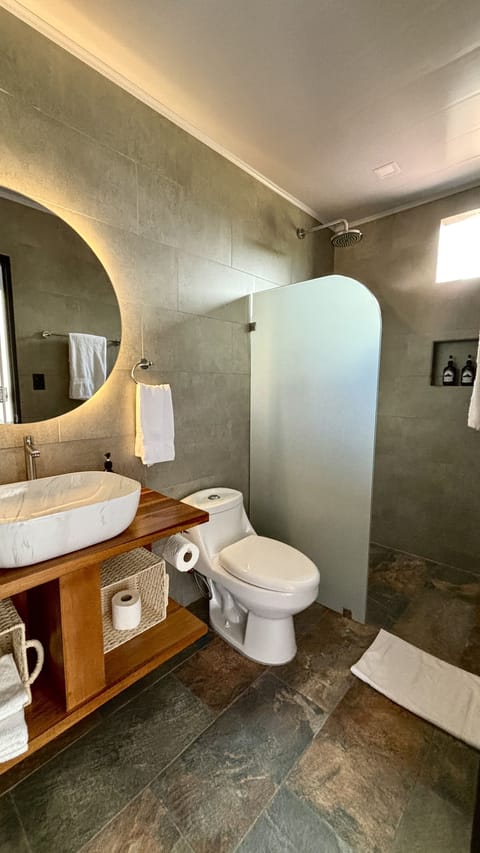 Superior Room, Mountain View | Bathroom | Shower, rainfall showerhead, hair dryer, towels