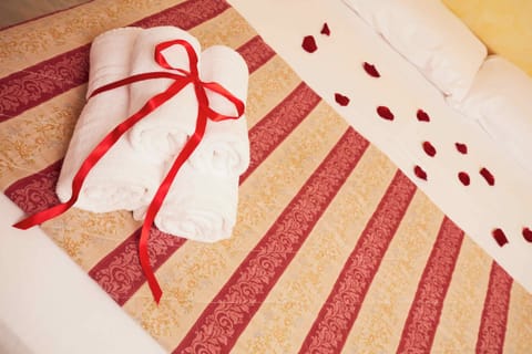 Family Apartment, 2 Bedrooms, 2 Bathrooms, Courtyard Area | Desk, blackout drapes, free cribs/infant beds, free rollaway beds