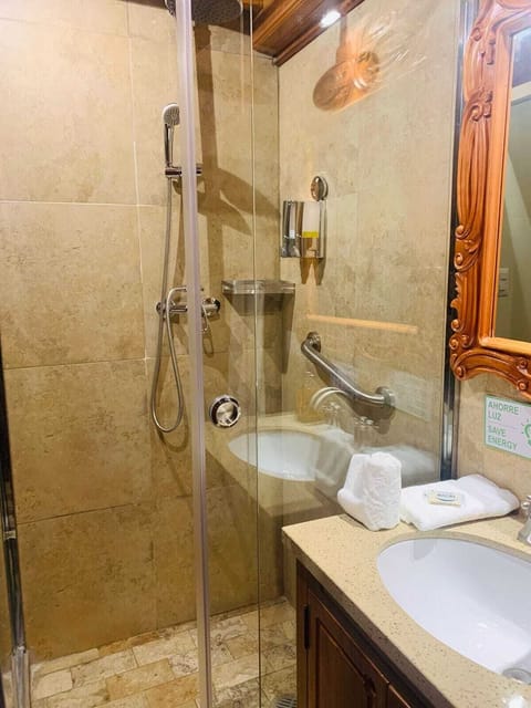 Standard Double Room | Bathroom | Shower, hair dryer, towels, soap