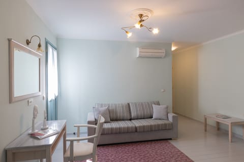 Suite, 1 Bedroom, Balcony | Living area | LED TV