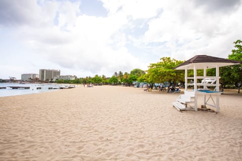 On the beach, white sand, windsurfing, 3 beach bars