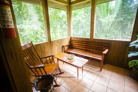 Exclusive Cabin, 2 Bedrooms, Garden View, Garden Area | Living area | Books