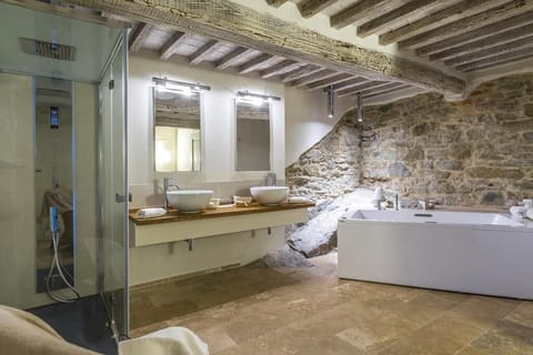 Junior Suite, Patio | Bathroom | Hair dryer, bathrobes, slippers, towels