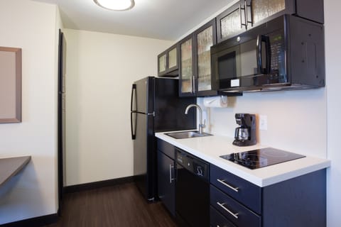 Suite, 1 Bedroom | Private kitchen | Full-size fridge, microwave, stovetop, dishwasher